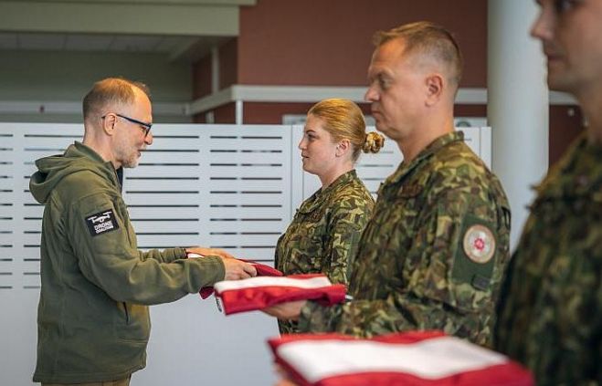 Foto - Ēriks Kukutis, Nacionālie bruņotie spēki
